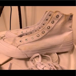 These are a pair of HUF classic cotton high tops.